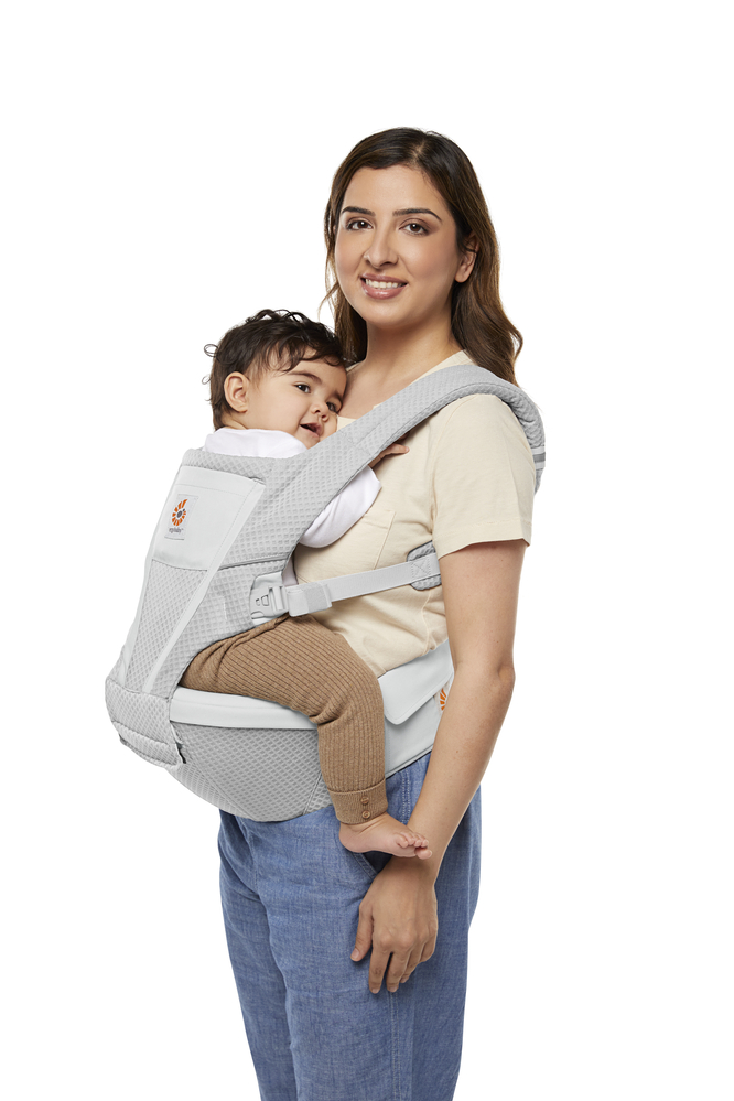 Mom using Alta Hip Seat Front Carry Inward Facing